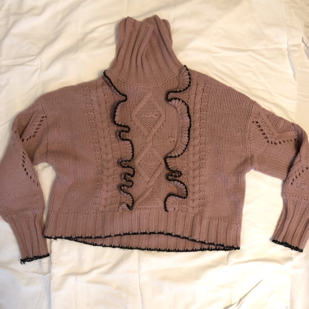 Turtleneck with ruffles.  Cinq a sept